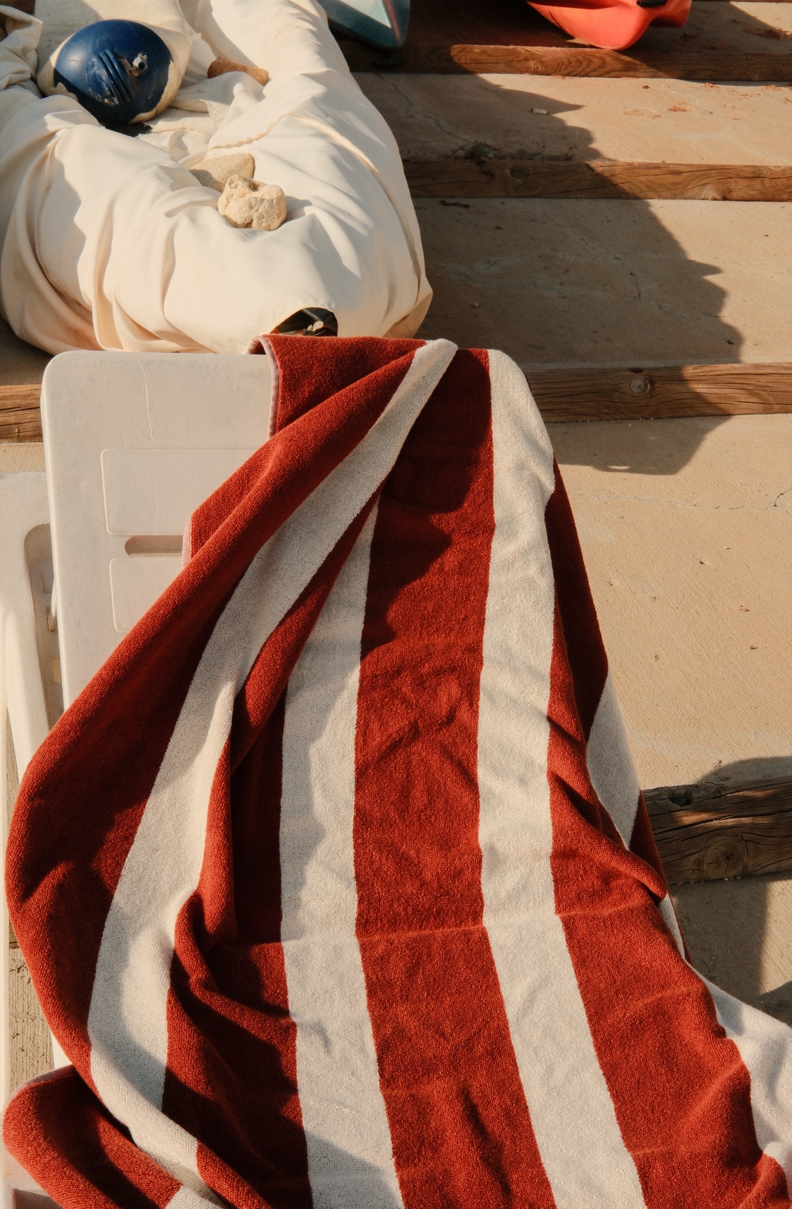 brasa terracotta towel on a sun lounger