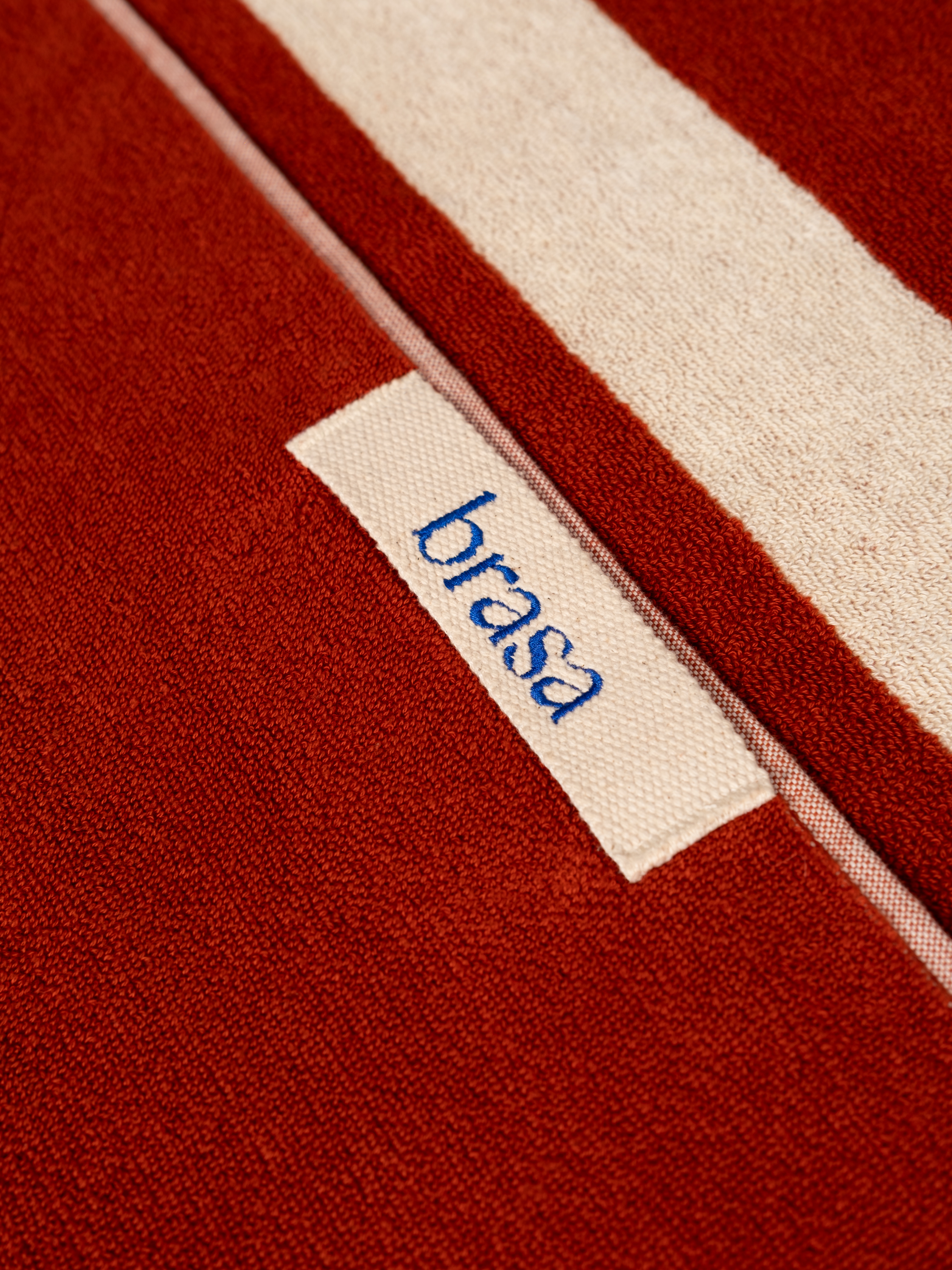 brasa terracotta striped towel, close-up texture